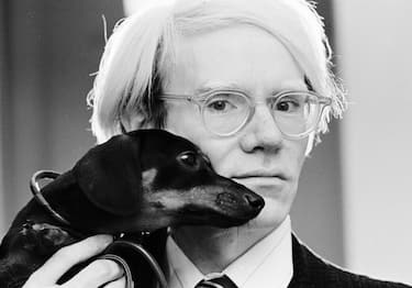 Andy Warhol poses with his beloved dachshund Archie in November 1973. (Photo by Jack Mitchell/Getty Images)