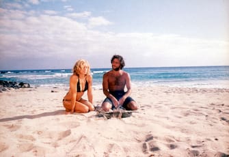 'Swept Away' Movie Stills Oct 11, 2002; Hollywood, California, UK; Amber (MADONNA) finds herself stranded on an island with Giuseppe (ADRIANO GIANINNI) in the movie 'Swept Away.'
Mandatory Credit: Photo by Daniel Smith/Columbia Tristar/ZUMA Press.
(
