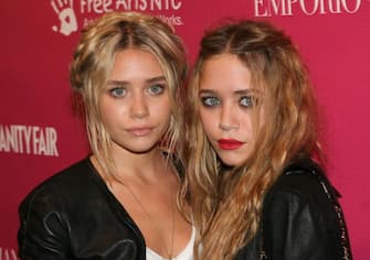 Ashley Olsen and Mary-Kate Olsen at the Phillips de Pury & Company in New York, New York (Photo by Mychal Watts/WireImage)