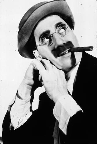circa 1935:  American comedian and actor Groucho Marx (1895 - 1977) whose cigar and moustache became his legendary trademark.  (Photo by MPI/Getty Images)