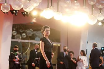 1271573657 VENICE, ITALY - SEPTEMBER 09: walks the red carpet ahead of the movie "Le Sorelle Macaluso" at the 77th Venice Film Festival on September 09, 2020 in Venice, Italy. (Photo by Elisabetta Villa/Getty Images)