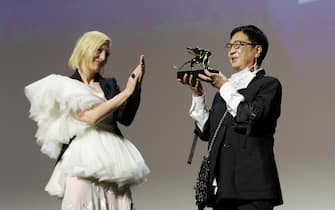 VENICE, ITALY - SEPTEMBER 08:  Director Ann Hui (R) acknowledges receiving a Golden Lion award for Lifetime Achievement from Jury President of the 77th Venice Film festival Cate Blanchett  at the Golden Lion For Lifetime Achivement Award Ceremony at the 77th Venice Film Festival on September 08, 2020 in Venice, Italy. (Photo by Vittorio Zunino Celotto/Getty Images)