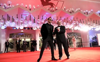 VENICE, ITALY - SEPTEMBER 11: Miguel Ángel Silvestre and Director Álex de la Iglesia walk the red carpet ahead of the movie "30 Monedas" (30 Coins) - Episode 1 at the 77th Venice Film Festival on September 11, 2020 in Venice, Italy. (Photo by Elisabetta Villa/Getty Images)