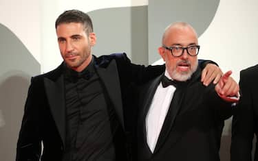 VENICE, ITALY - SEPTEMBER 11: Miguel Ángel Silvestre and Director Álex de la Iglesia walk the red carpet ahead of the movie "30 Monedas" (30 Coins) - Episode 1 at the 77th Venice Film Festival on September 11, 2020 in Venice, Italy. (Photo by Elisabetta Villa/Getty Images)