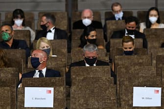 Name tags of Jury President of the 77th Venice Film festival, Australian-US actress Cate Blanchett (L) and Jury member of the 77th Venice Film festival, US actor Matt Dillon are scotched on the theater's seat prior to the opening ceremony on the opening day of the 77th Venice Film Festival, on September 2, 2020 at Venice Lido, during the COVID-19 infection, caused by the novel coronavirus. (Photo by Alberto PIZZOLI / AFP) (Photo by ALBERTO PIZZOLI/AFP via Getty Images)