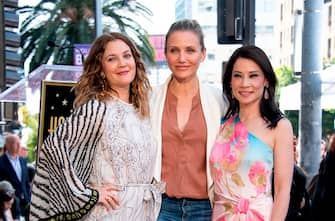 Actress Drew Barrymore (L), Cameron Diaz (C) and Lucy Liu (R) stand on the star during Liu's Walk of Fame ceremony in Hollywood on May 1, 2019. - Lucy Liu's star is the 2,662nd star on the Hollywood Walk Of Fame in the Category of Television. (Photo by VALERIE MACON / AFP)        (Photo credit should read VALERIE MACON/AFP via Getty Images)