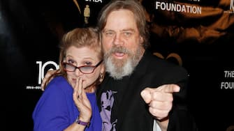 BEVERLY HILLS, CA - SEPTEMBER 30:  (L-R) Carrie Fisher and Mark Hamill attend the Midnight Mission Golden Heart awards gala at the Beverly Wilshire Hotel on September 30, 2014 in Beverly Hills, California.  (Photo by Tibrina Hobson/Getty Images)