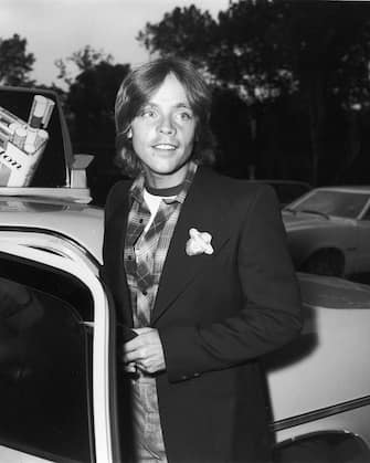 American actor Mark Hamill stands by the open door of a taxicab, New York City, July 1977. (Photo by Frank Edwards/Fotos International/Getty Images)