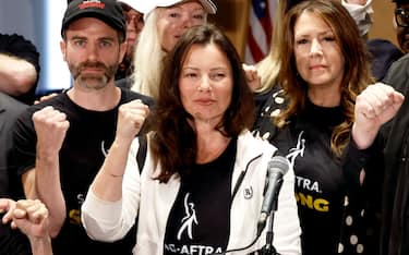 LOS ANGELES, CALIFORNIA - JULY 13: (L-R) Ben Whitehair, Frances Fisher, SAG President Fran Drescher, Joely Fisher, National Executive Director, and SAG-AFTRA members are seen as SAG-AFTRA National Board holds a press conference for vote on recommendation to call a strike regarding the TV/Theatrical contract at SAG-AFTRA on July 13, 2023 in Los Angeles, California. (Photo by Frazer Harrison/Getty Images)