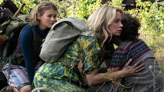 L-r, Regan (Millicent Simmonds), Evelyn (Emily Blunt) and Marcus (Noah Jupe) brave the unknown in "A Quiet Place Part II.â  