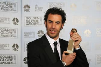 Beverly Hills, UNITED STATES:  Comedian Sacha Baron Cohen poses with the award for Best Performance by an Actor in a Motion Picture - Musical or Comedy 15 January, 2007 at the 64th Annual Golden Globe Awards in Beverly Hills, California. Cohen won for "Borat: Cultural Learnings Of America For The Make Benefit Glorious Nstion Of Kazakhstan."      AFP PHOTO GABRIEL BOUYS/STF  (Photo credit should read GABRIEL BOUYS/AFP via Getty Images)