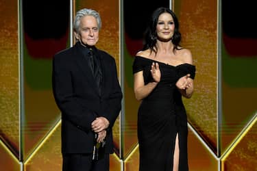 NEW YORK, NEW YORK - FEBRUARY 28: Michael Douglas and Catherine Zeta-Jones present the award for Best Picture Drama onstage during the 78th Annual Golden GlobeÂ® Awards at The Rainbow Room on February 28, 2021 in New York City. (Photo by Kevin Mazur/Getty Images for Hollywood Foreign Press Association)