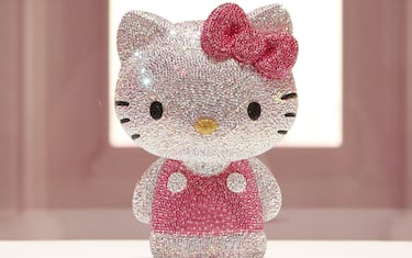 A Sanrio Co. Hello Kitty figure made of Swarovski crystals is on display during the 'SWAROVSKI presents "House of Hello Kitty"' event at Omotesando Hills in Tokyo, Japan, on Wednesday, June 29, 2011. Sanrio Co., the Japanese owner of the Hello Kitty character brand, may boost profit after arresting a 10-year slide in sales by slapping its logo on wine, wallpaper and minicars. Photographer: Junko Kimura/Bloomberg via Getty Images