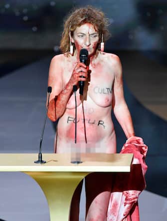 PARIS, FRANCE - MARCH 12: (EDITORS NOTE: Image contains nudity.) Corinne Masiero speaks on stage during the 46th Cesar Film Awards Ceremony At L'Olympia on March 12, 2021 in Paris, France. (Photo by Pierre Villard/Pool/Getty Images)