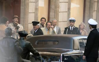 US actor Al Pacino (C) stands in Via Condotti on the set during the shooting of the film 'House of Gucci' in Rome, Italy, 22 March 2021. The upcoming biopic crime movie directed by British filmmaker Ridley Scott is based on the 2001 book 'The House of Gucci: A Sensational Story of Murder, Madness, Glamor, and Greed' by Sara Gay Forden. ANSA/MASSIMO PERCOSSI