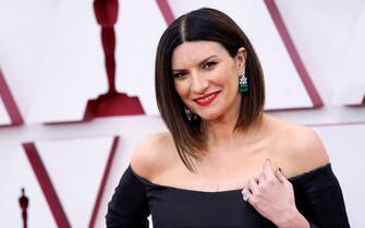 Laura Pausini arrives at the Oscars on Sunday, April 25, 2021, at Union Station in Los Angeles. (AP Photo/Chris Pizzello, Pool)