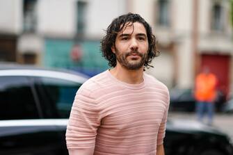 PARIS, FRANCE - JUNE 22: Actor Tahar Rahim wears a pink pullover, outside Hermes, during Paris Fashion Week - Menswear Spring/Summer 2020, on June 22, 2019 in Paris, France. (Photo by Edward Berthelot/Getty Images)