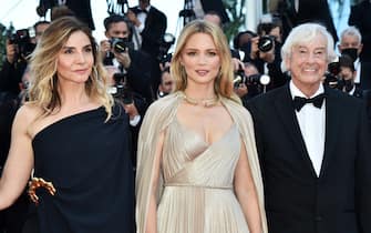 CANNES, FRANCE - JULY 09: Clotilde Courau, Virgine Efira and director Paul Verhoeven attend the "Benedetta" screening during the 74th annual Cannes Film Festival on July 09, 2021 in Cannes, France. (Photo by Dominique Charriau/WireImage)