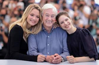 (From L) Belgian actress Virginie Efira, Dutch film director Paul Verhoeven and Belgian-Greek actress Daphne Patakia pose during a photocall for the film "Benedetta" at the 74th edition of the Cannes Film Festival in Cannes, southern France, on July 10, 2021. (Photo by Valery HACHE / AFP) (Photo by VALERY HACHE/AFP via Getty Images)