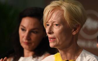 epa09348219 Tilda Swinton attends the press conference for 'Memoria' during the 74th annual Cannes Film Festival, in Cannes, France, 16 July 2021. The festival runs from 06 to 17 July.  EPA/Kate Green / POOL *** Local Caption *** CANNES, FRANCE - JULY 16: Director Nabil Ayouch attends the "Haut Et Fort (Casablanca Beats)" press conference during the 74th annual Cannes Film Festival on July 16, 2021 in Cannes, France. (Photo by Kate Green/Getty Images)