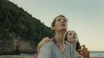 (from left) Prisca (Vicky Krieps) and Maddox (Thomasin McKenzie) in Old, written for the screen and directed by M. Night Shyamalan.