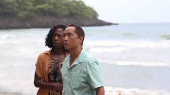 (from left) Patricia (Nikki Amuka-Bird) and Jarin (Ken Leung) in Old, written for the screen and directed by M. Night Shyamalan.