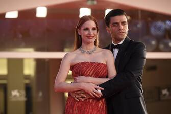 Guatemalan-US actor Oscar Isaac (R) and US actress Jessica Chastain, arrive for the premiere of 'Scenes from a Marriage' during the 78th annual Venice International Film Festival, in Venice, Italy, 04 September 2021. The movie is presented out competition at the festival running from 01 to 11 September.  ANSA/ETTORE FERRARI
