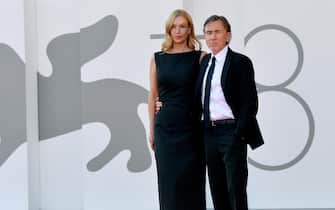 British actor Tim Roth and his wife Nikki Butler arrive for the premiere of 'Sundown' during the 78th Venice Film Festival in Venice, Italy, 05 September 2021. The movie is presented in Official competition 'Venezia 78' at the festival running from 01 to 11 September 2021.   ANSA/ETTORE FERRARI
 