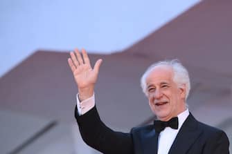 Italian actor Toni Servillo arrives for the screening of the film  "Qui Rido Io" (The King of Laughter) presented in competition on September 7, 2021 during the 78th Venice Film Festival at Venice Lido. (Photo by Marco BERTORELLO / AFP) (Photo by MARCO BERTORELLO/AFP via Getty Images)