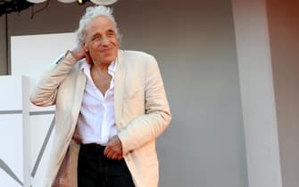 US filmmaker Abel Ferrara arrives for the premiere of 'Freaks Out' during the 78th annual Venice International Film Festival, Venice, Italy, 08 September 2021. The movie is presented in the Official competition 'Venezia 78' at the festival running from 01 to 11 September.  ANSA/CLAUDIO ONORATI






 