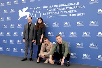 1339433300 VENICE, ITALY - SEPTEMBER 10: (L-R) Yevhen Chernykov, Alina Zevakova, Yevhen Grygoriev and Oleksandr Rudynskyi attend the photocall of "Nosorih" during the 78th Venice International Film Festival on September 10, 2021 in Venice, Italy. (Photo by John Phillips/Getty Images)