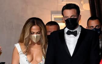 US actor Ben Affleck and US actress and singer Jennifer Lopez wearing a protective face mask arrive for the screening of movie 'The Last Duel' during the 78th annual Venice International Film Festival, in Venice, Italy, 10 September 2021. The movie is presented out competition at the festival running from 01 to 11 September. ANSA/CLAUDIO ONORATI