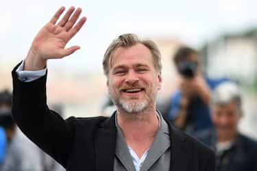 British director Christopher Nolan waves on May 12, 2018 during a photocall at the 71st edition of the Cannes Film Festival in Cannes, southern France. (Photo by LOIC VENANCE / AFP)        (Photo credit should read LOIC VENANCE/AFP via Getty Images)