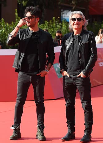 Italian singers Luciano Ligabue (R) and Fabrizio Moro pose on the red carpet at the 16th annual Rome International Film Festival, in Rome, Italy, 16 October 2021. The film festival runs from 14 to 24 October. ANSA/ETTORE FERRARI
 
