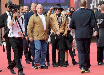 US actor Johnny Depp (C) arrives for the screening of 'Puffins' at the 16th annual Rome International Film Festival, in Rome, Italy, 17 October 2021. The film festival runs from 14 to 24 October. ANSA/ETTORE FERRARI