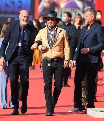 US actor Johnny Depp (C) arrives for the screening of 'Puffins' at the 16th annual Rome International Film Festival, in Rome, Italy, 17 October 2021. The film festival runs from 14 to 24 October. ANSA/ETTORE FERRARI