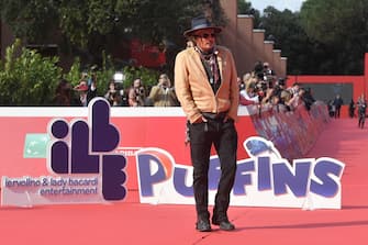 US actor Johnny Depp poses as he arrives on October 17, 2021 at the Parco della Musica venue for the 19th edition of "Alice nella citta", an autonomous and parallel section of the 16th Rome Film Festival, where he presents the animated TV mini series "Puffins", in which he acts as voice talent. (Photo by Tiziana FABI / AFP) (Photo by TIZIANA FABI/AFP via Getty Images)
