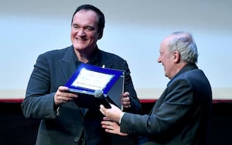 US director Quentin Tarantino receives the Lifetime Achievement Award from Italian director Dario Argento (R) at the 16th annual Rome International Film Festival, in Rome, Italy, 19 October 2021. The film festival runs from 14 to 24 October. ANSA/ETTORE FERRARI 