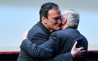 US director Quentin Tarantino embraces Italian director Dario Argento (R) as he receives the Lifetime Achievement Award at the 16th annual Rome International Film Festival, in Rome, Italy, 19 October 2021. The film festival runs from 14 to 24 October. ANSA/ETTORE FERRARI 