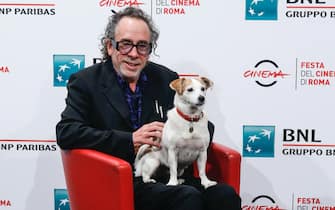 American director Tim Burton and his dog Levi, poses during a photocall at the 16th annual Rome International Film Festival, in Rome, Italy, 23 October 2021. The Festa del Cinema di Roma runs from 14 to 24 October. ANSA/FABIO FRUSTACI