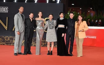 ROME, ITALY - OCTOBER 24:  (L-R) Nate Moore, Kit Harington, Angelina Jolie, Chloe Zhao, Gemma Chan, Richard Madden and Victoria Alonso attend the red carpet of the movie "Eternals" during the 16th Rome Film Fest 2021 on October 24, 2021 in Rome, Italy. (Photo by Daniele Venturelli/Daniele Venturelli/WireImage)