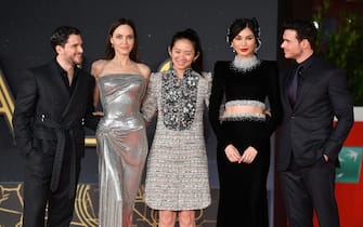 ROME, ITALY - OCTOBER 24:  (L-R) Kit Harington, Angelina Jolie, Chloe Zhao, Gemma Chan and Richard Madden attend the red carpet of the movie "Eternals" during the 16th Rome Film Fest 2021 on October 24, 2021 in Rome, Italy. (Photo by Daniele Venturelli/Daniele Venturelli/WireImage)