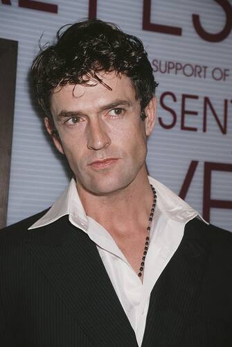 168883408 English actor Rupert Everett attends IFFP Presents Yves Saint Laurent: Forty Years of Creation, in New York City, 1998. (Photo by Rose Hartman/Getty Images)