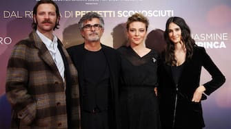 MILAN, ITALY - DECEMBER 16: Alessandro Borghi, Paolo Genovese, Jasmine Trinca and Linda Caridi attend the photocall of the movie 