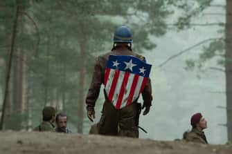 Chris Evans (standing, with shield) plays Steve Rogers, Bruno Ricci (center left) plays Dernier, and J.J. Feild (wearing red beret) plays Falsworth in Marvel Studios? CAPTAIN AMERICA: THE FIRST AVENGER. ?