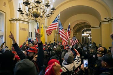 WASHINGTON, DC - JANUARY 06: Supporters of US President Donald Trump protest inside the US Capitol on January 6, 2021, in Washington, DC.  Demonstrators breeched security and entered the Capitol as Congress debated the 2020 presidential election Electoral Vote Certification. (Photo by Brent Stirton/Getty Images)