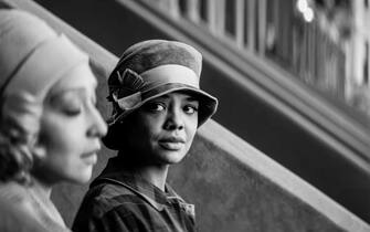 USA. Tessa Thompson and Ruth Negga  in a scene from the (C)Netflix new film: Passing (2021). 
Plot: The movie follows the unexpected reunion of two high school friends, whose renewed acquaintance ignites a mutual obsession that threatens both of their carefully constructed realities.
Directed by Rebecca Hall .
Ref: LMK110-J7379-240921
Supplied by LMKMEDIA. Editorial Only.
Landmark Media is not the copyright owner of these Film or TV stills but provides a service only for recognised Media outlets. pictures@lmkmedia.com