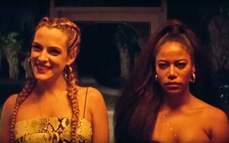 USA. Taylour Paige and Riley Keough in a scene from the (C)A24 new film :  Zola (2020). 
Plot: A stripper named Zola embarks on a wild road trip to Florida. 
Ref: LMK110-J7010-070421
Supplied by LMKMEDIA. Editorial Only.
Landmark Media is not the copyright owner of these Film or TV stills but provides a service only for recognised Media outlets. pictures@lmkmedia.com