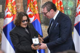 BELGRADE, SERBIA - FEBRUARY 15: Actor Johnny Depp receiving the Gold Medal of Merit from President of Serbia Aleksandar Vucic, on the occasion of Serbia's Statehood Day, on February 15, 2022 in Belgrade, Serbia.  (Photo by Srdjan Stevanovic / Getty Images)