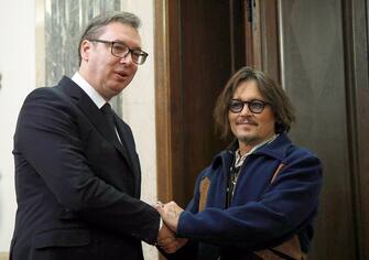 Famous US actor Johnny Depp, who visits Serbia to promote the animated series "Puffins" produced by the Serbian branch of Iervolino Studio, meets Serbian President Aleksandar Vucic in Belgrade, Serbia on October 19, 2021.